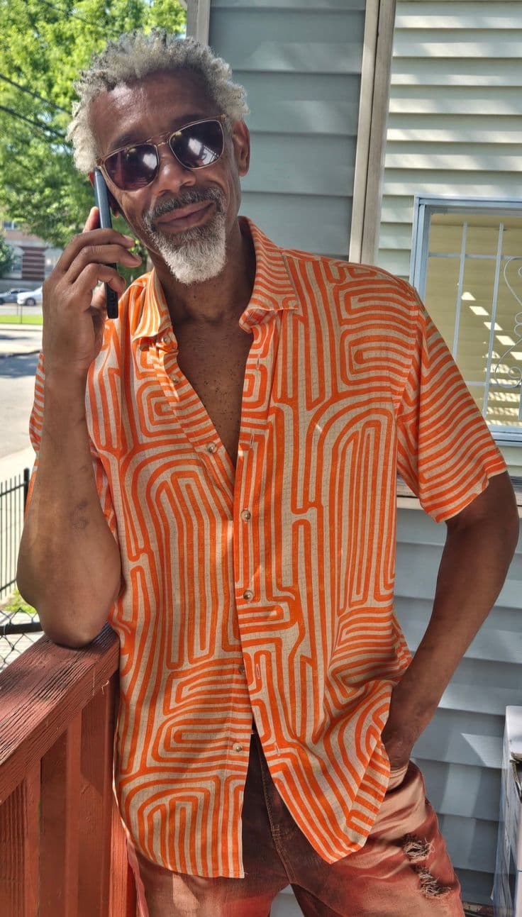 A photo of a man on a porch